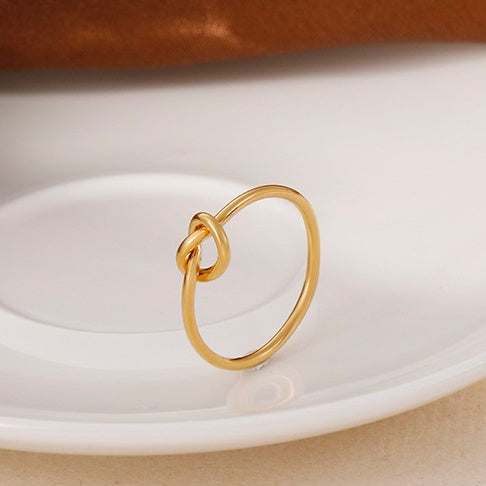 R035 dainty love knot ring