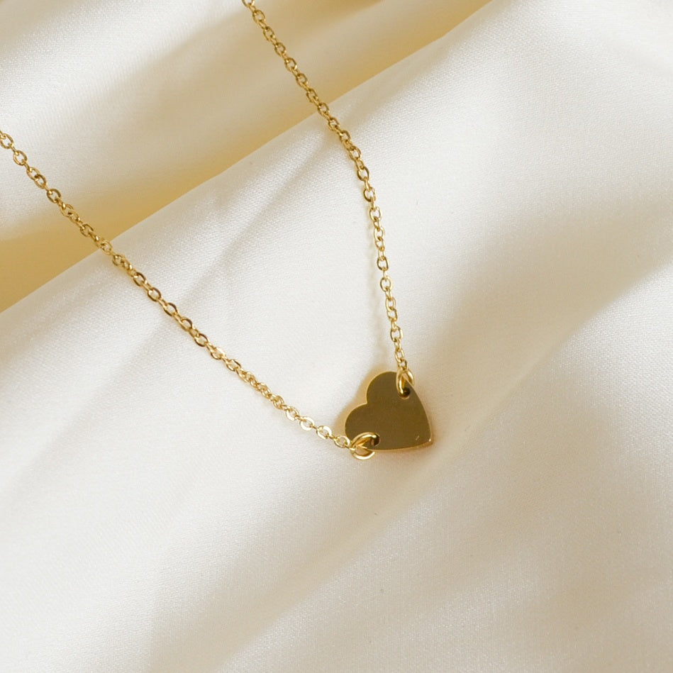 Alyssa gold dainty heart charm bracelet