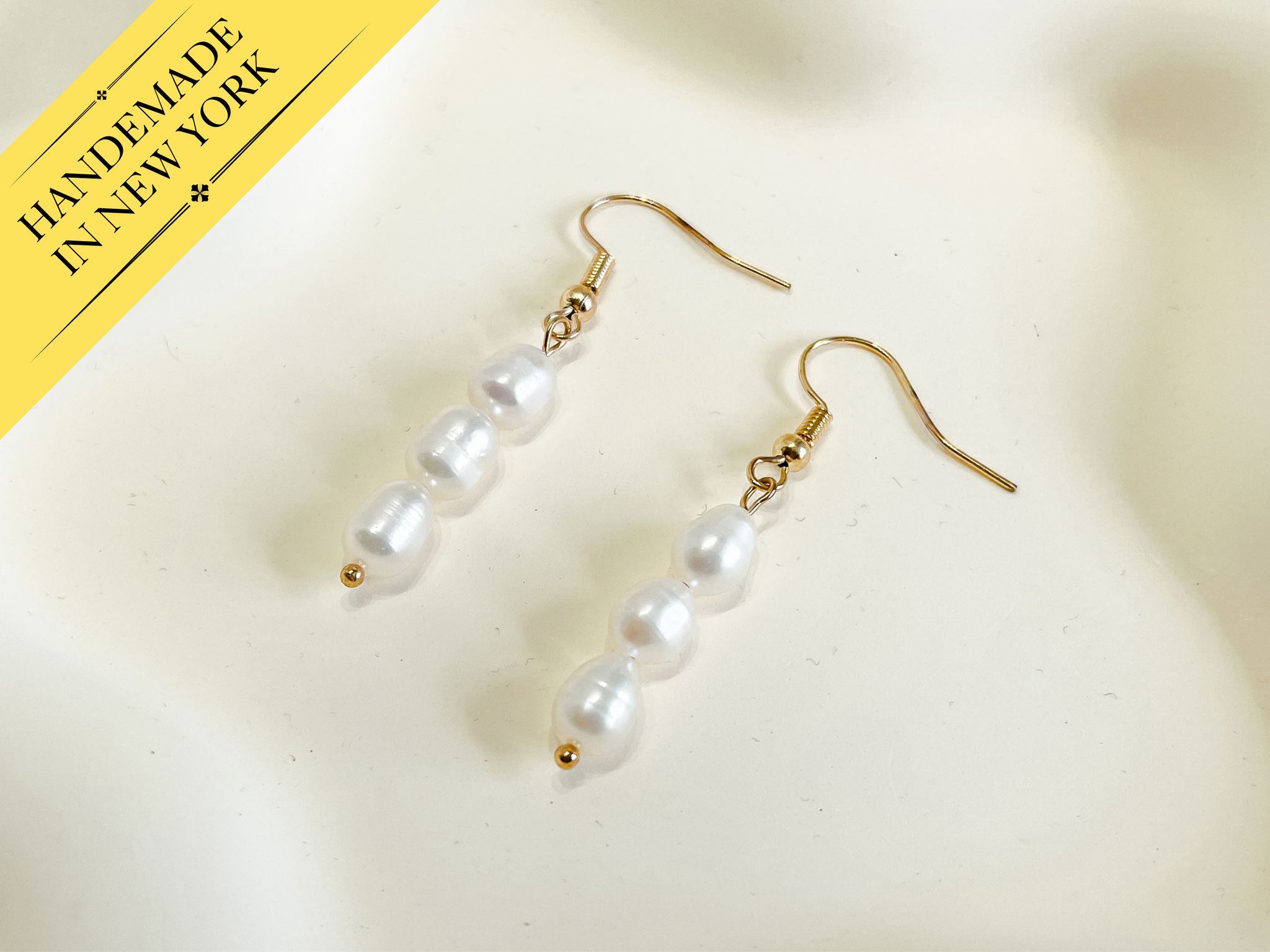 Yellow gold pearl earrings, Pearl dangle earrings at ₹1950 | Azilaa