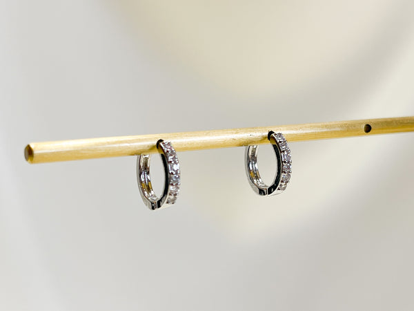 E162 paved huggie hoop earrings in silver and gold