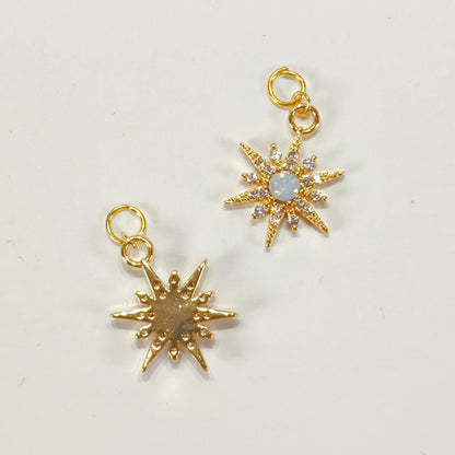 C006 gold starburst charm