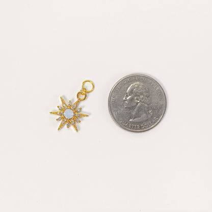 C006 gold starburst charm