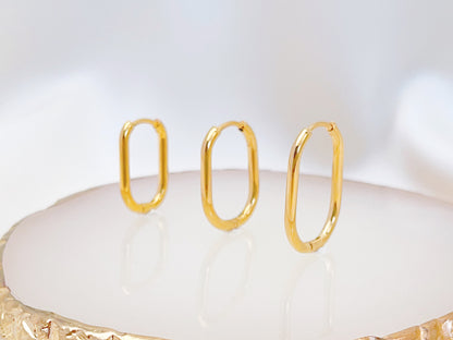 E080 gold oval rectangular hoops