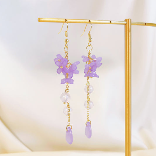 E195 purple lily flower long dangle earrings