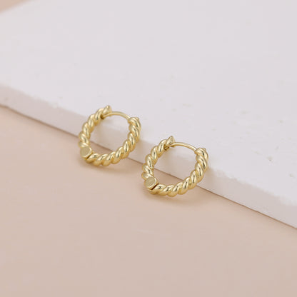 E118 gold twisted huggie hoop earrings