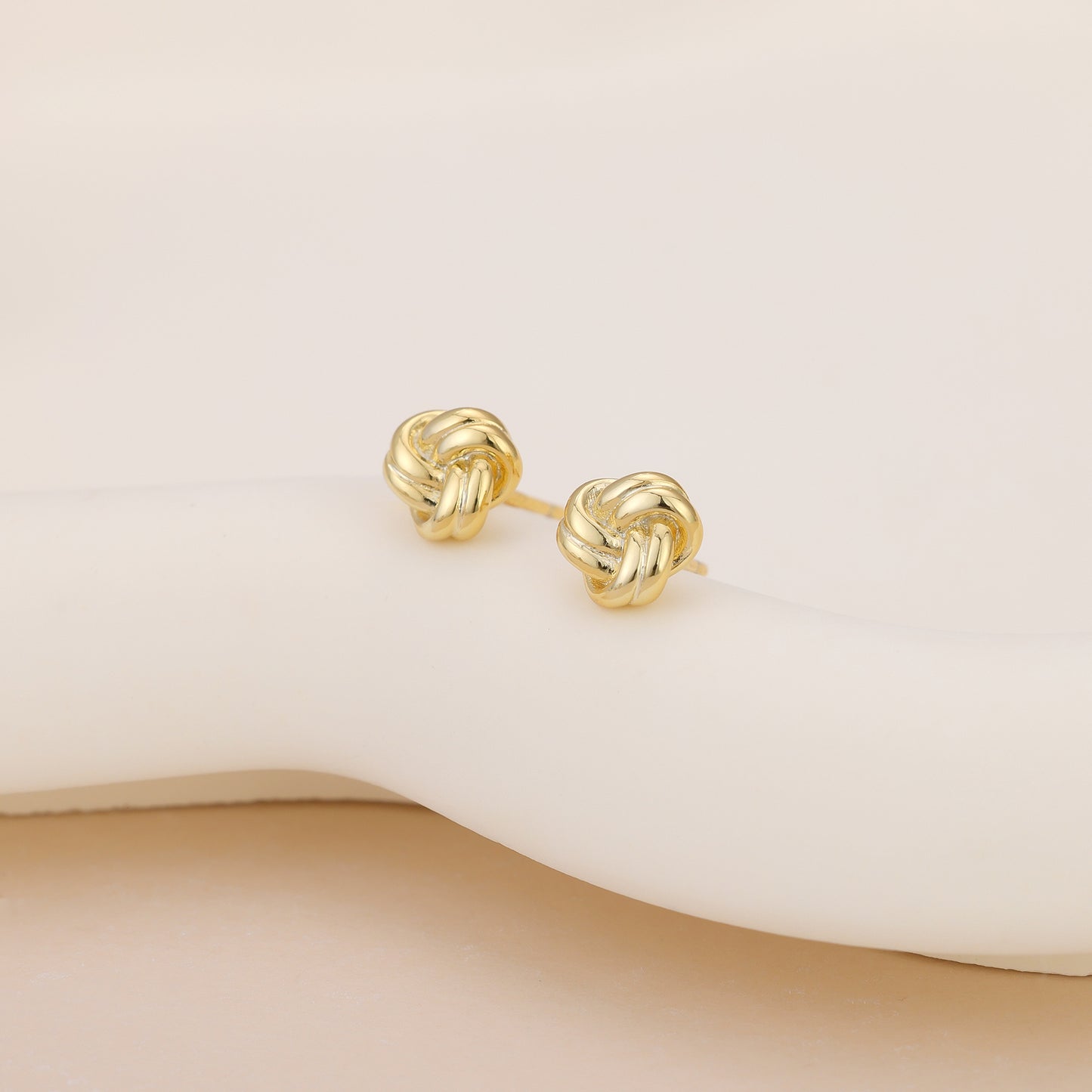 E171 dainty love knot stud earrings