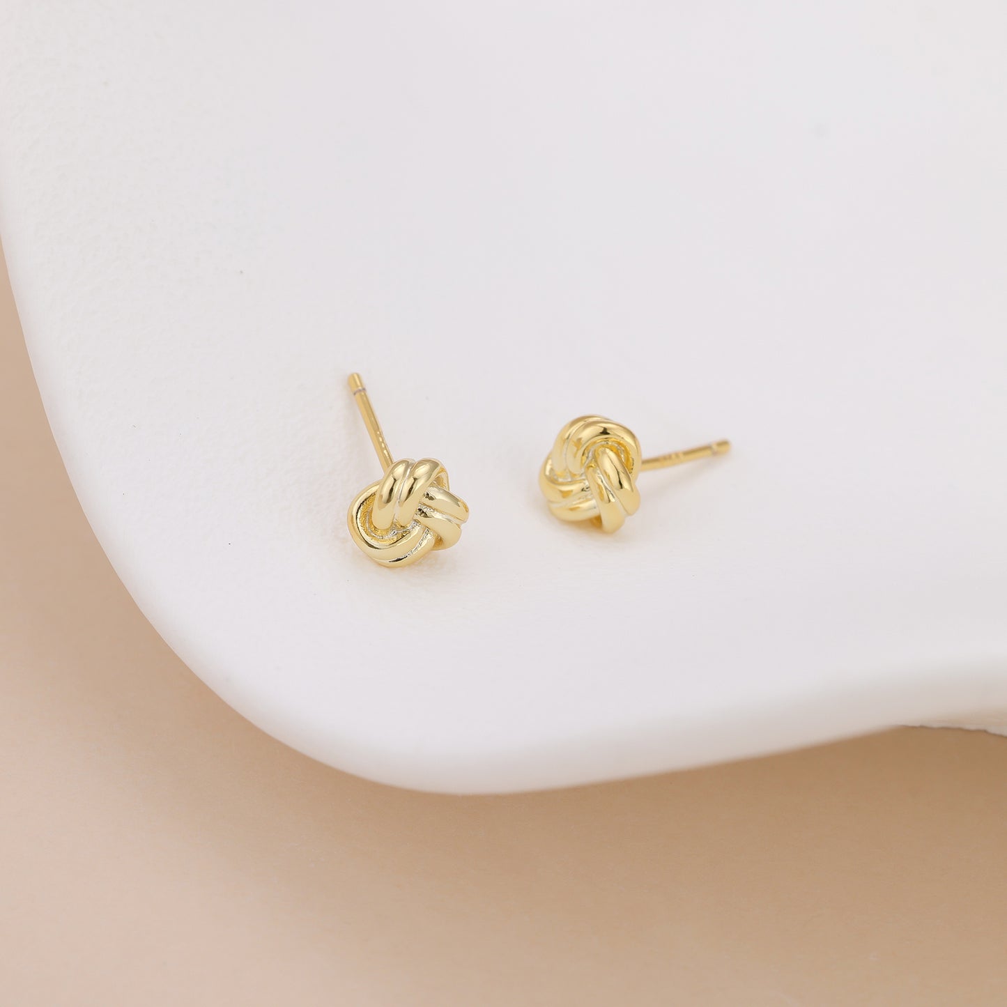 E171 dainty love knot stud earrings