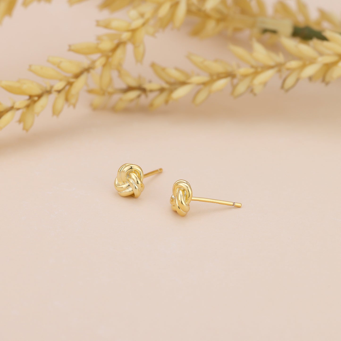 E171 dainty love knot stud earrings