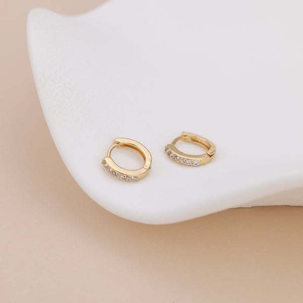 E162 paved huggie hoop earrings in silver and gold