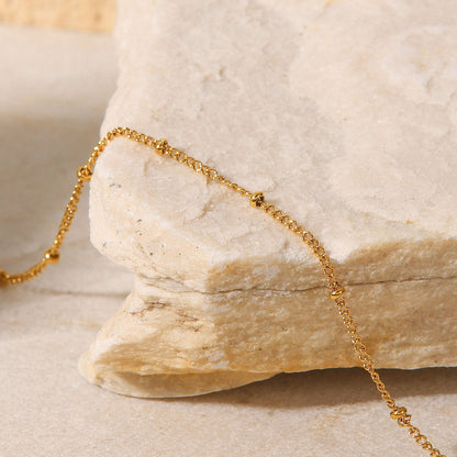 Angelina gold dainty satellite chain bracelet