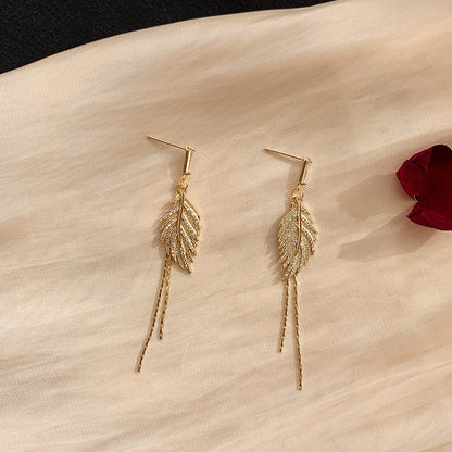 Alaina gold crystal paved leaf dangle earrings