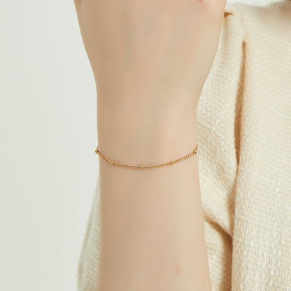 Angelina gold dainty satellite chain bracelet