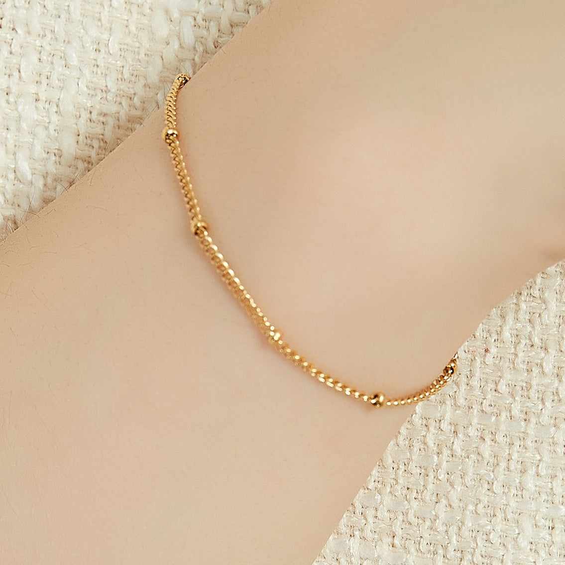 Angelina gold dainty satellite chain bracelet