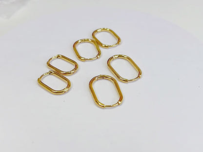 E080 gold oval rectangular hoops